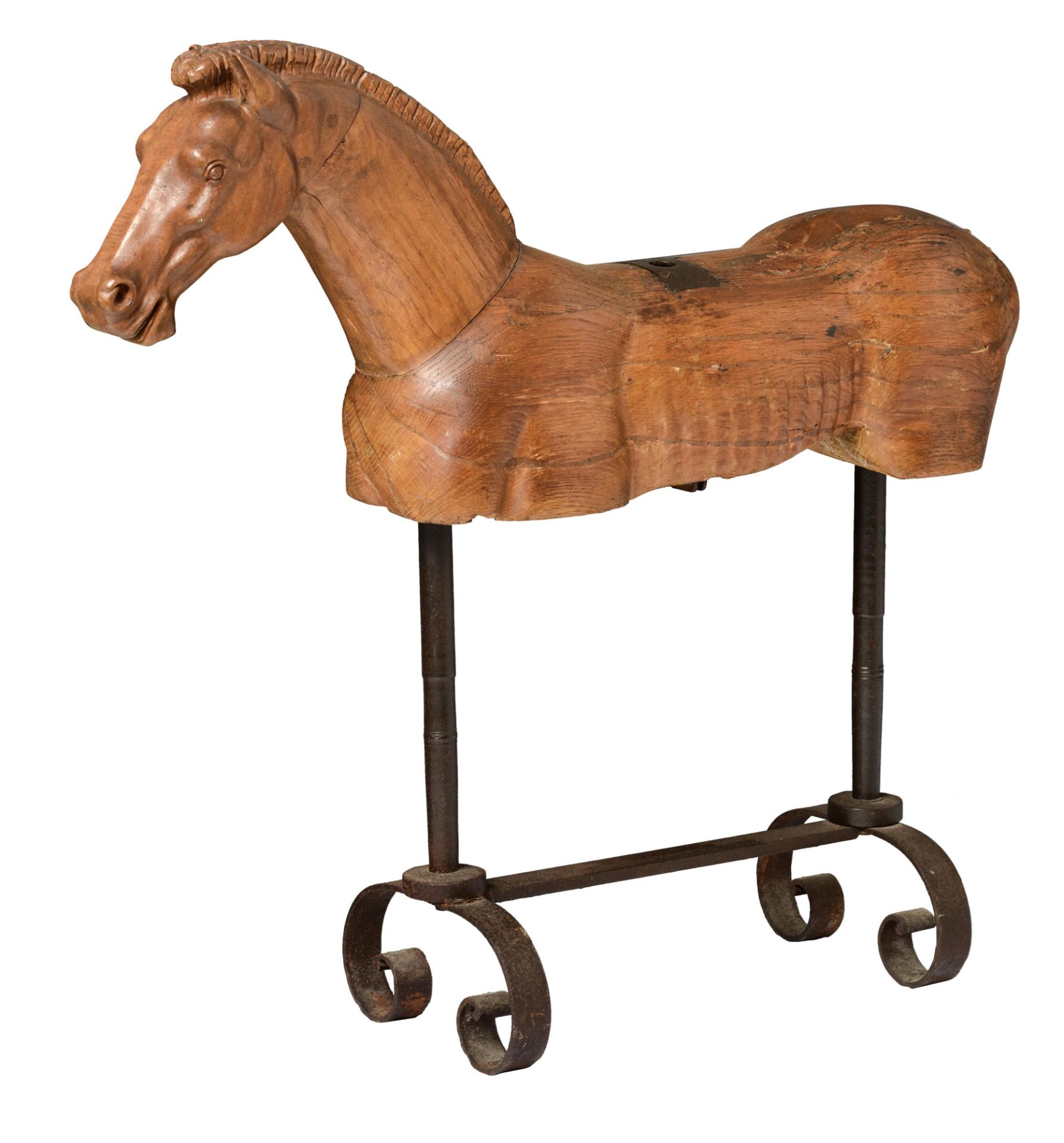 A carved oak horse on a wrought iron stand, H 92 - W 97 cm