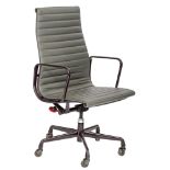 An Eames EA119 office chair, design for Herman Miller, grey leather on a purple painted metal frame,