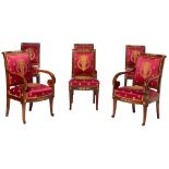 A set of four chairs and two armchairs in French Empire style, mahogany with gilt brass fittings, an