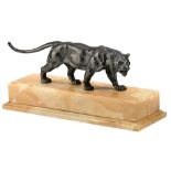 No visible signature, an Art Deco sculpture of a lioness, patinated bronze on a yellow Sienna marble