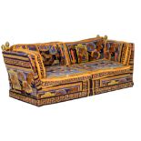 A vintage 'Knole' type flaired arm sofa, design by Stefano Giovanni, upholstered with a Versace fabr