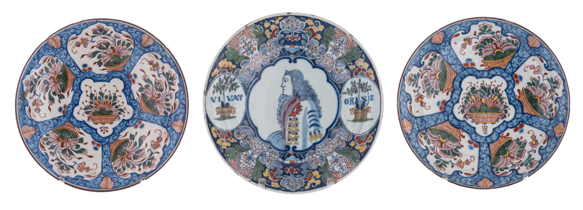 A fine polychrome decorated Dutch Delftware 'Oranje' plate, with inscription 'W.K.H.F.P.V.O.R.' (Wil