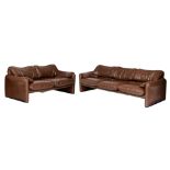 A set of two '70s design brown leather Maralunga settees by Cassina, consisting of a two-seater and