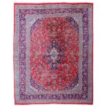 An Oriental rug, floral decorated, woollen, 295 x 380 cm