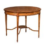 A Neoclassical walnut round table, decorated with marquetry in various wood types depicting garlands