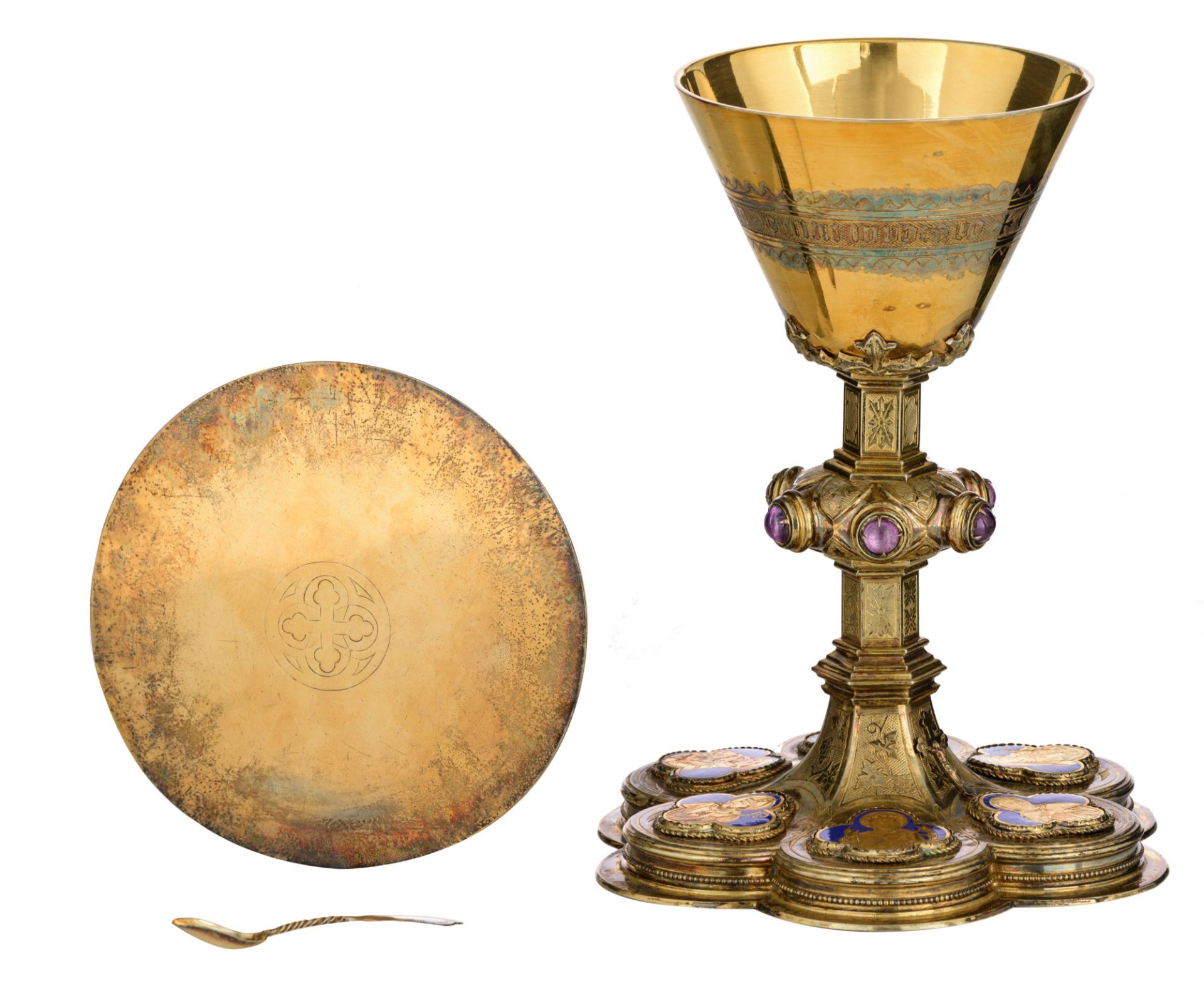 A six-lobed silver, gilt silver and partly blue enamelled Gothic Revival chalice set with cabochon-c