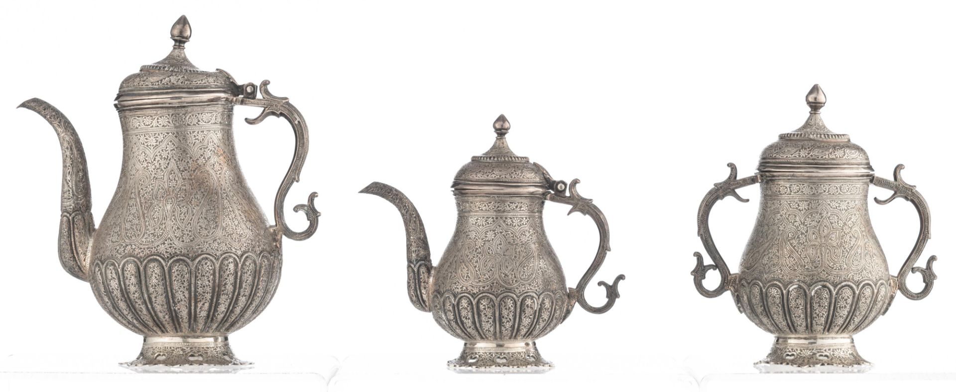 A Persian inspired horror vacui decorated tea set, no visible hallmarks but tested on silver purity, - Image 2 of 10