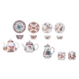 A Chinese famille rose export porcelain teapot and cup and saucer, the cup and saucer decorated with