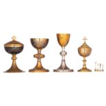 Two ciboria and two chalices with only the cup itself made out of silver / gilt silver, the feet and