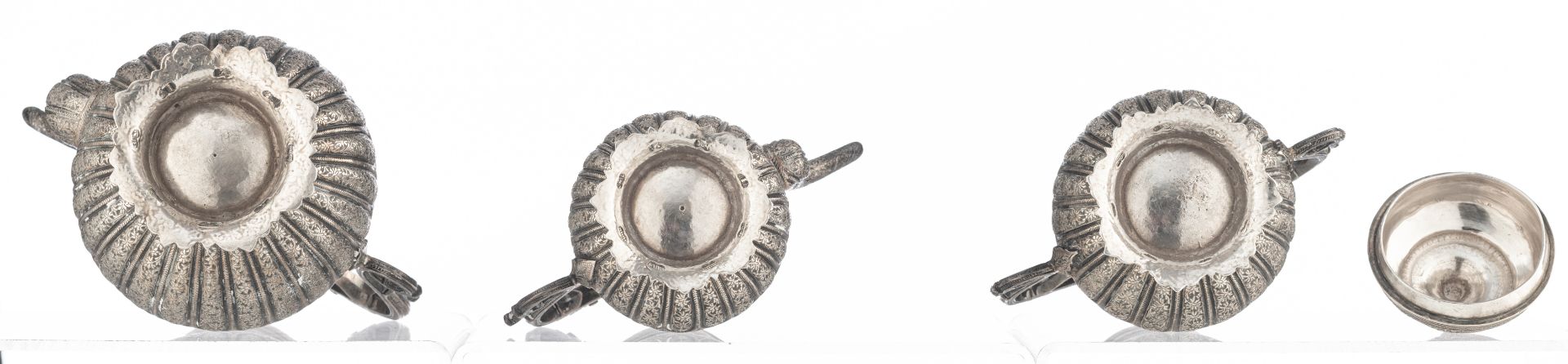 A Persian inspired horror vacui decorated tea set, no visible hallmarks but tested on silver purity, - Image 7 of 10