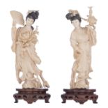 Two ivory Chinese beauties on wooden bases, first half 20thC, H 24 - 25 cm,