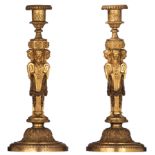 A fine pair of ormolu bronze Louis XVI style candlesticks, decorated with satyr masks, guirlandes, r