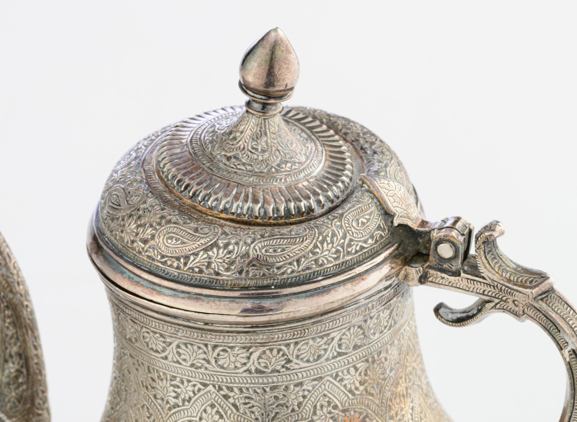 A Persian inspired horror vacui decorated tea set, no visible hallmarks but tested on silver purity, - Image 10 of 10