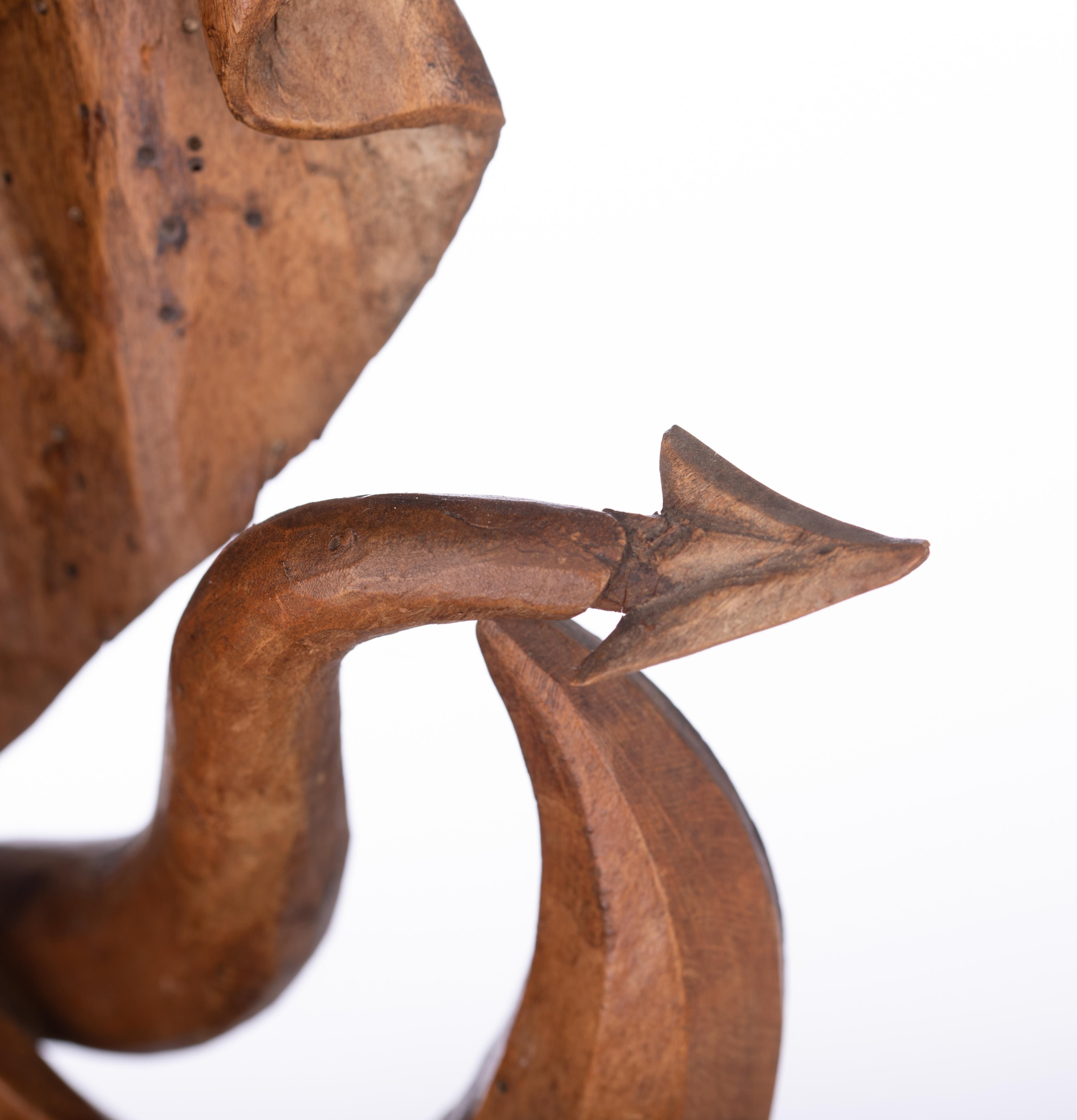 A walnut sculpture of the Madonna holding the Holy Child and standing on the crescent moon destroyin - Image 9 of 19