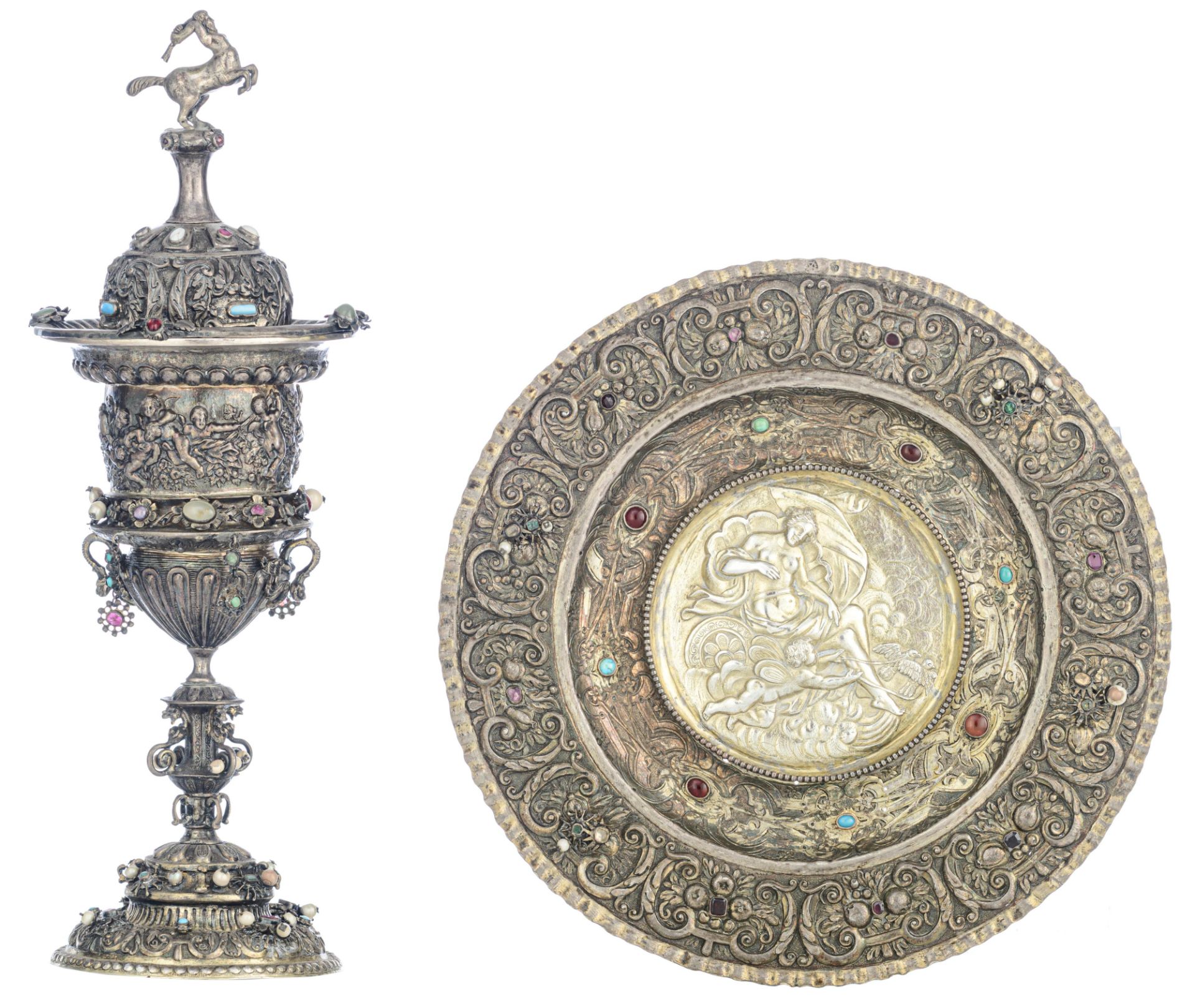 A richly decorated Renaissance style presentation cup on a matching platter, all over decorated by t