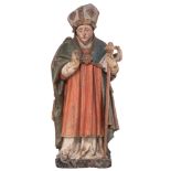 A walnut sculpture of a young abbot,ÿwith traces of polychrome paint, 15thC, H 89 cm