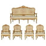 An imposing Rococo style Napoleon III gilt and patinated salon set, with flower decorated upholstery