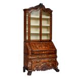 A fine burr and walnut veneered Dutch secretary with a matching display cabinet on top, decorated wi