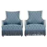 A pair of 'crapaud' chairs, with blue woollen upholstery, decorated with geometric patterns, H 87,5