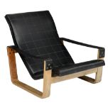 A Pulkka lounge chair, design by Ilmari Lappalainen for Asko?, a 60?s edition, black leather and ply
