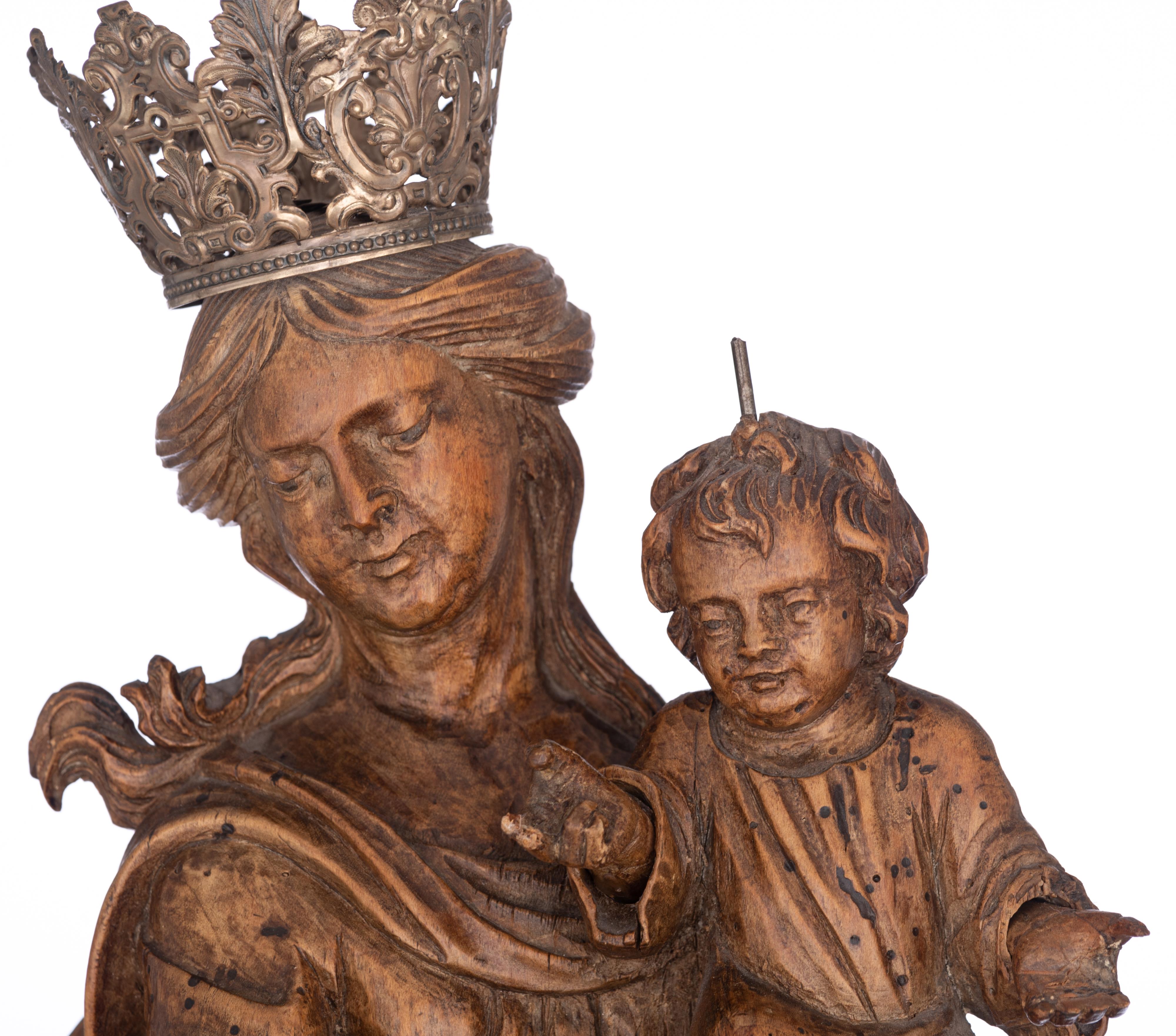 A walnut sculpture of the Madonna holding the Holy Child and standing on the crescent moon destroyin - Image 5 of 19