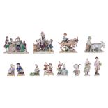 A large collection of polychrome decorated Saxony porcelain figurines and groups, containing: singin