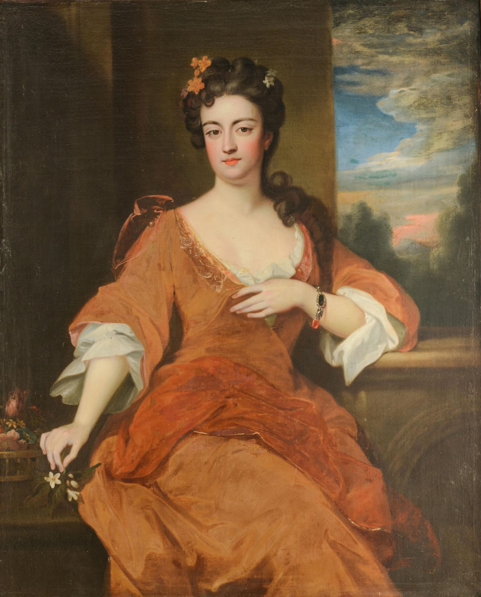 A very charming three-quarter-length portrait of a well-rounded beauty holding a jasmine flower, the