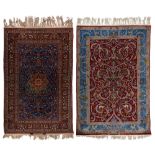 An Oriental Isphahan carpet, floral decorated, added: a ditto carpet, decorated with various exotic