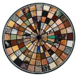 A round tabletop in Italian pietra dura, decorated with geometric motifs in various types of marble,