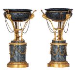 A fine pair of Hasan green granite Napoleon III vases, decorated with gilt bronze mounts of vines an