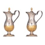 A pair of 18thC silver and vermeil jugs, no visible hallmarks, H 15,5 cm, weight: ca. 541 g