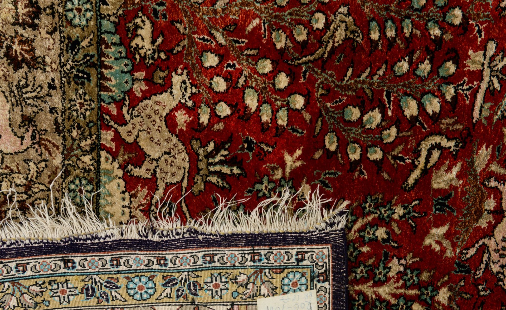 An Oriental silk carpet, decorated with various animals and birds in a landscape setting, 137 x 205 - Bild 3 aus 5