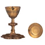A silver and gilt silver gothic Revival six-lobed chalice with engraved decoration, inscribed 'Brugi