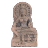 A sandstone architectural fragment of a Hindu god, India, H 58,5 - W 34 - D 19,5 cm