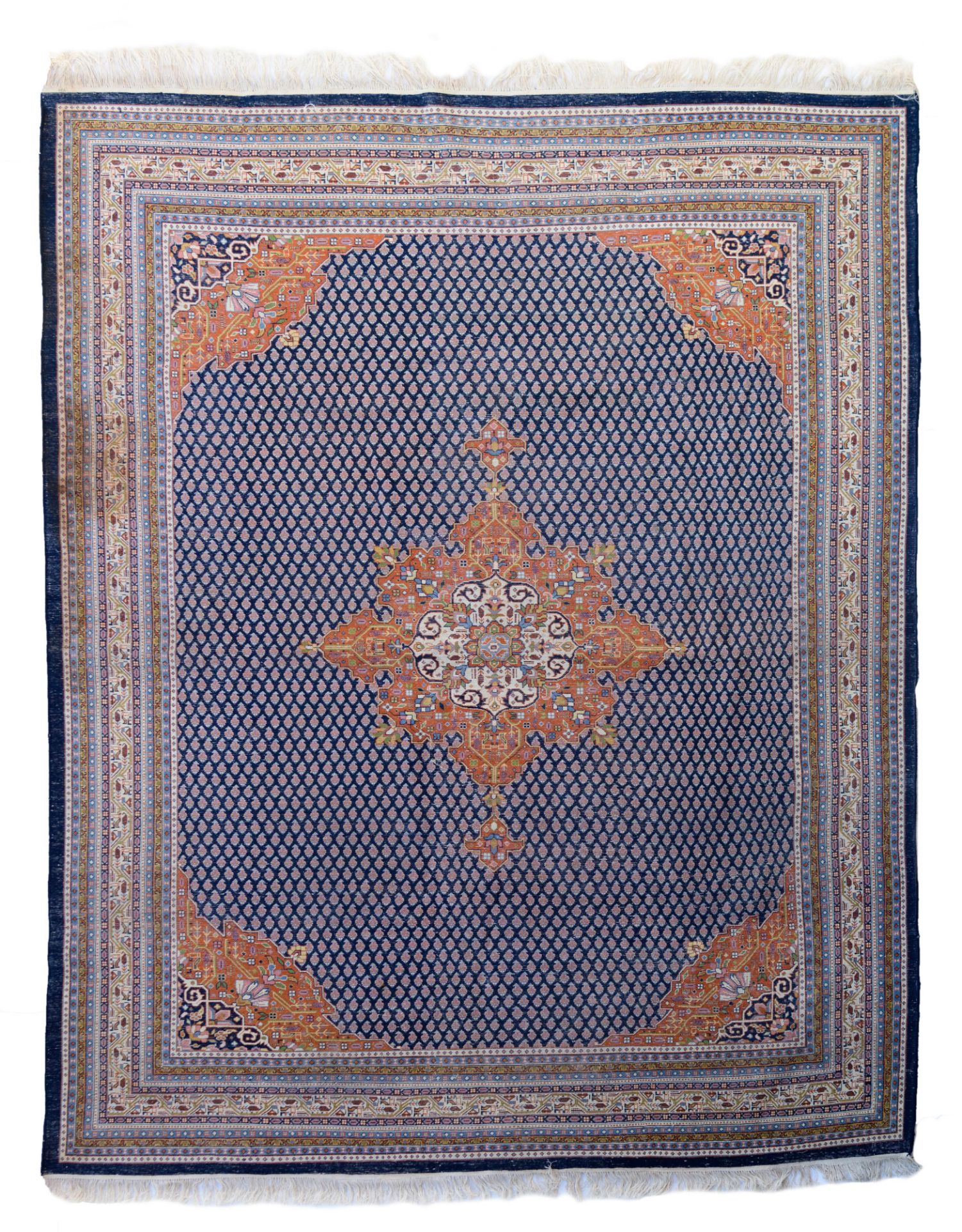 An Oriental rug, decorated with geometric motifs, woollen, 269 x 340 cm