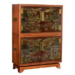 A Chinese inspired rosewood veneered cabinet, the doors decorated with chinoiseries, H 156 - W 113ÿ