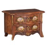 A walnut veneered Rococo style commode, decorated with gilt bronze mounts and hand-painted porcelain