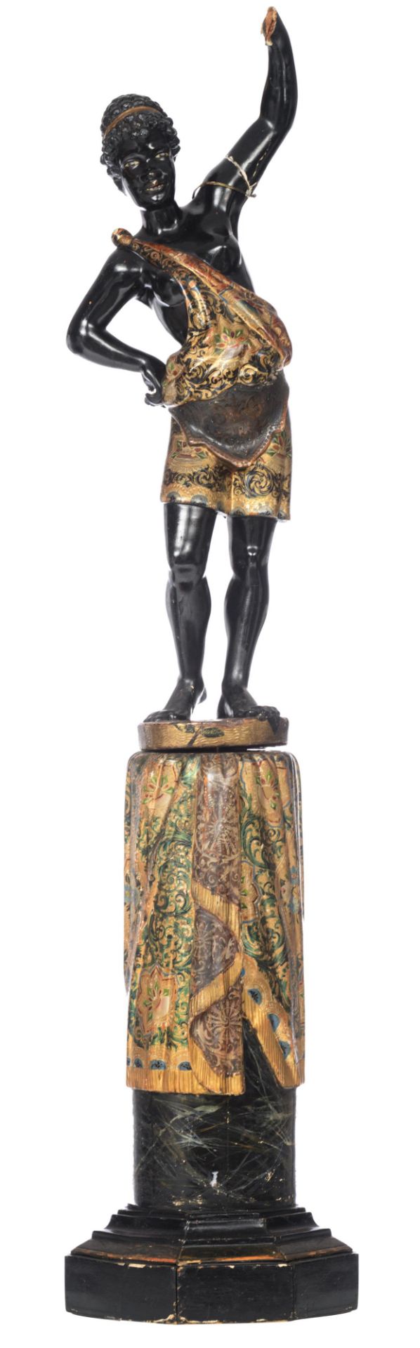 A Venetian type polychrome painted and gilt wooden blackamoor torchŠre figure, dressed in an elabora