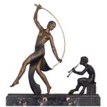 Guirande J.D., a faun playing music for a female dancer, an Art Deco patinated bronze on a noir Belg