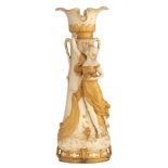 A fine and large Art Nouveau Royal Dux vase, relief decorated with a beauty enjoying a bunch of grap