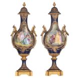 A pair of covered bleu royale ground SŠvres baluster-shaped vases with Neoclassical gilt bronze moun