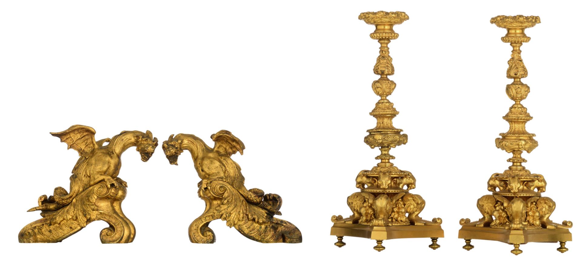 A pair of gilt bronze Louis XIV style andirons with dragons on top, H 20 cm. Added a pair of gilt br