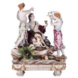 A fine Vienna porcelain group depicting the Bacchus scene of Apollo served by the nymphs, marked, 19