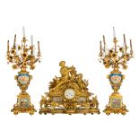 A very imposing Neoclassical ormolu bronze three-piece mantle clock, decorated with 'bleu c‚leste' g