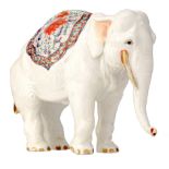 A polychrome and gilt decorated porcelain elephant, marked Chantilly, H 14,5 cm
