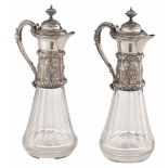 A fine pair of crystal cut decanters with Neoclassical silver and gilt silver mounts, decorated with