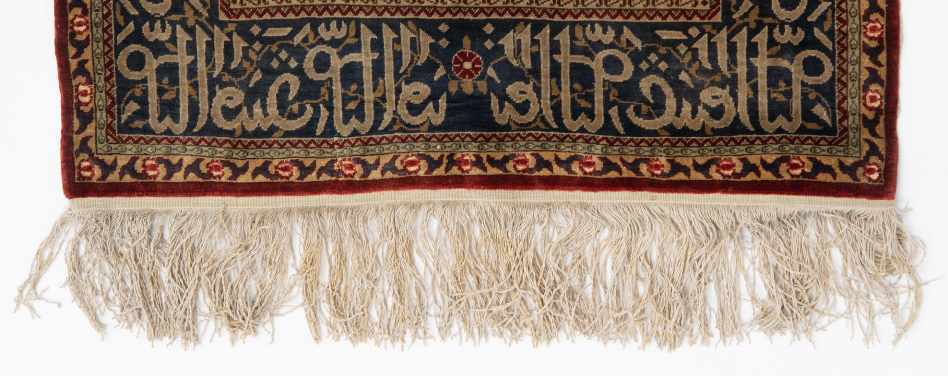 An Oriental silk on silk Hereke rug, decorated with a flower vase, the details finely brocaded with - Bild 8 aus 9