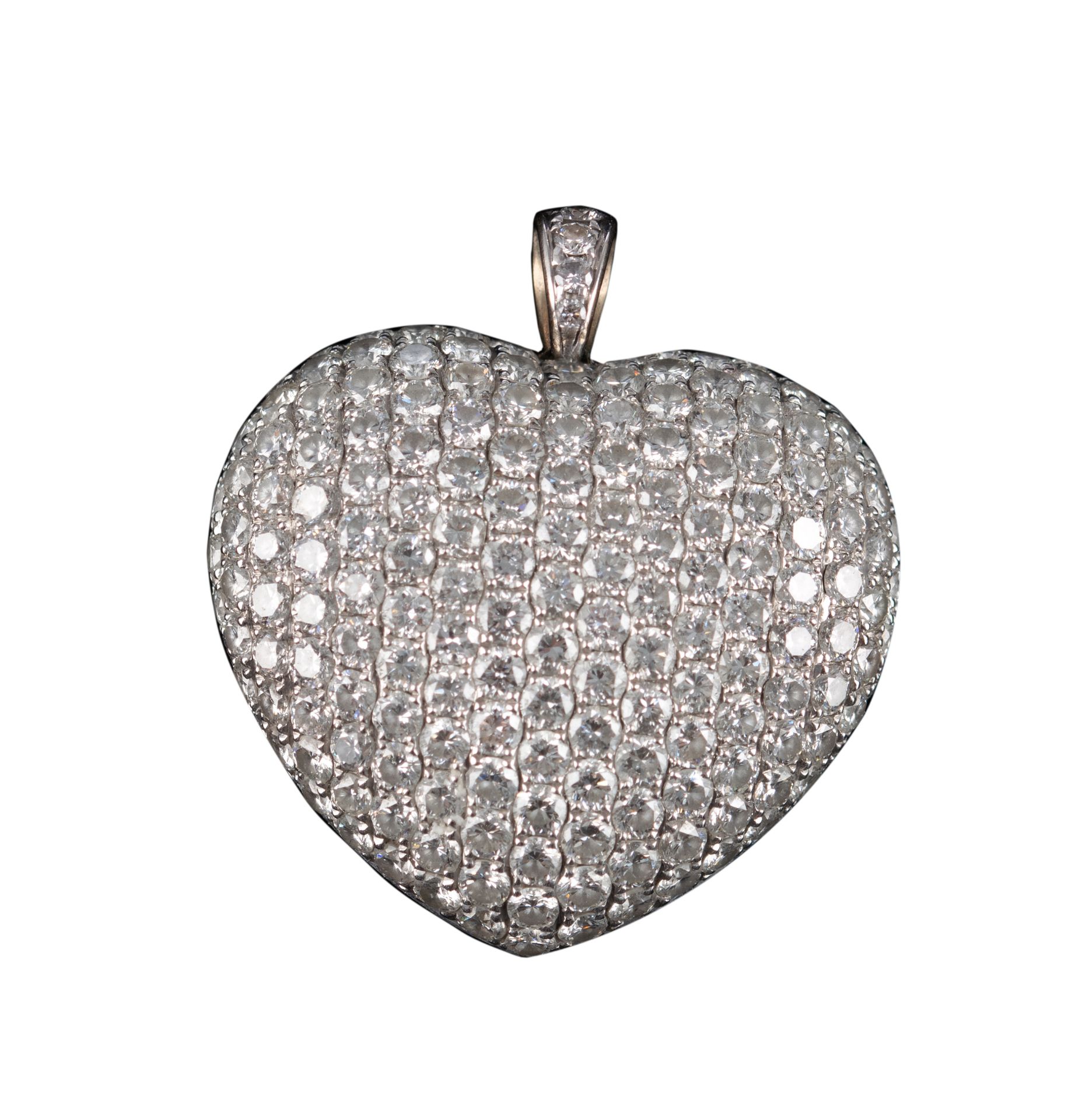 An 18ct white gold heart-shaped pendant, the front (and the loop) set all-over with brilliant-cut di