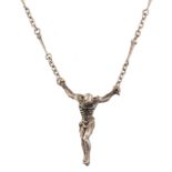 Salvador Dali, a limited edition silver pendant modelled as the figure of Christ, hanging to a textu