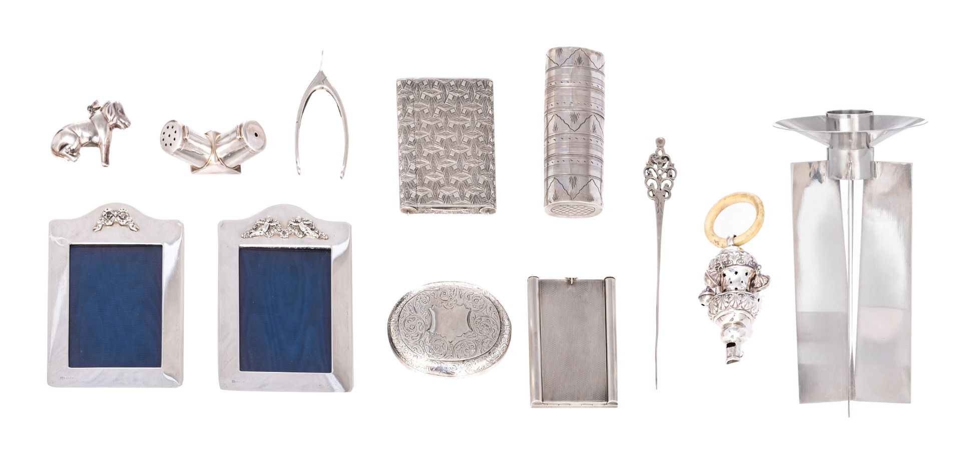 A various collection of English sterling silver items, containing: an Art Deco candle holder (hallma